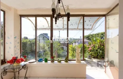 Casa com 2 quartos à venda na Rua Oscar Tollens, 300, Santa Tereza, Porto Alegre