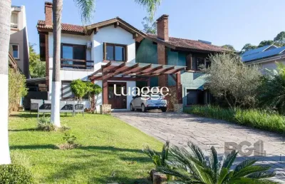 Casa em condomínio fechado com 4 quartos à venda na Avenida Juca Batista, 8083, Belém Novo, Porto Alegre