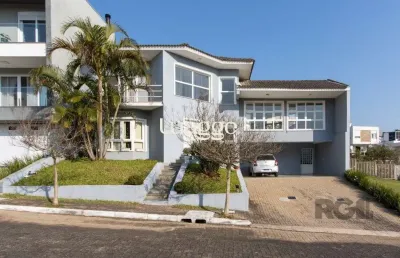 Casa em condomínio fechado com 3 quartos à venda na Rua Adriano Pereira da Silva, 518, Vila Nova, Porto Alegre