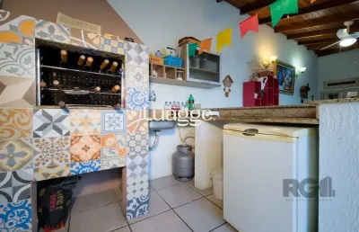 Casa em condomínio fechado com 3 quartos à venda na Avenida Eduardo Prado, 2101, Cavalhada, Porto Alegre