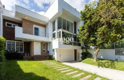 Casa com 3 quartos à venda na Avenida Fábio Araújo Santos, 1295, Nonoai, Porto Alegre