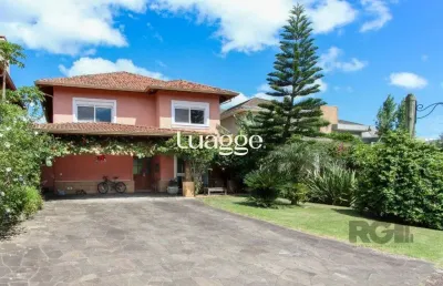 Casa em condomínio fechado com 4 quartos à venda na Avenida Juca Batista, 9095, Belém Novo, Porto Alegre