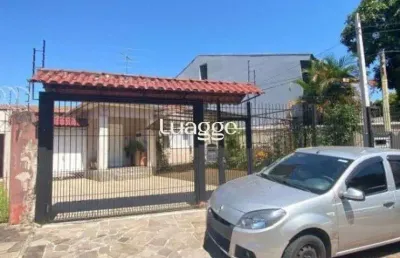 Casa 4 dormitórios i vaga 8 carros i bairro camaquã