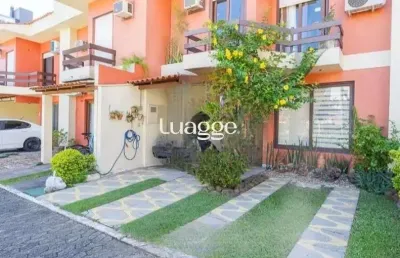 Linda casa com 3 dormitórios, sendo 1 suíte, sala ampla no condomínio de ótima localização