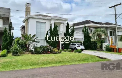 Casa em condomínio fechado com 4 quartos à venda na Avenida Central, 2578, Atlântida, Xangri-Lá