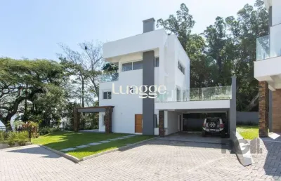 Casa em condomínio fechado com 3 quartos para alugar na Avenida Coronel Marcos, 1314, Pedra Redonda, Porto Alegre