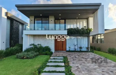 Este belíssimo sobrado à venda no capão ilhas resort,