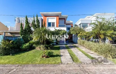 Casa em condomínio fechado com 4 quartos à venda na Avenida Juca Batista, 8090, Belém Novo, Porto Alegre