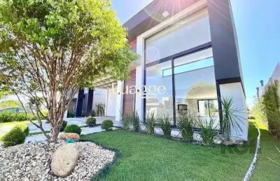 Casa em condomínio fechado com 5 quartos à venda na Rua Onório Germano, 2106, Condomínio Dubai Resort, Capão da Canoa