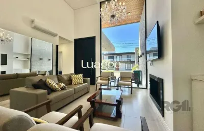 Casa em condomínio fechado com 4 quartos à venda na Rua Rio Divisa, 105, Atlântida, Xangri-Lá