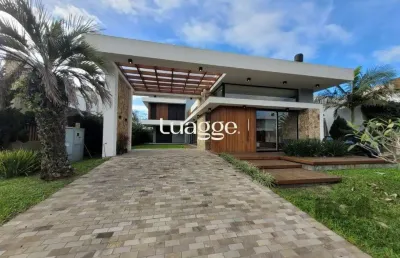 Casa em condomínio fechado com 4 quartos à venda na Avenida Jaçanã, 1028, Atlântida, Xangri-Lá