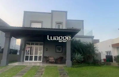 Casa em condomínio fechado com 3 quartos à venda na Rua Rio Novo, 2173, Atlântida, Xangri-Lá