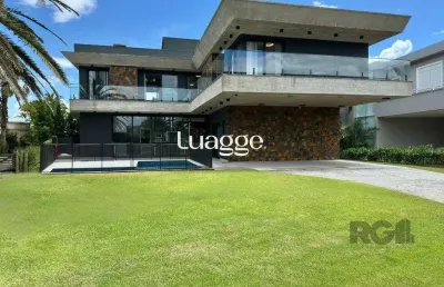 Casa em condomínio fechado com 4 quartos à venda na Avenida Paraguassu, 119, Centro, Xangri-Lá