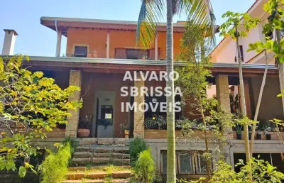 Casa canto dos pássaros, com 4 suítes e mais um quarto reversível. salas de jantar, lareira e estar cozinha e lavanderia escritorio. 480m2.at 380m2.ac