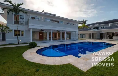 Casa climatizada, com 5 suítes e piscina no condomínio marina do guarujá sp