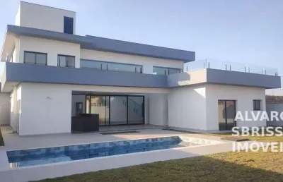 Casa com piscina  e 4 suítes à venda no condomínio campos de santo antônio ii com 330m2 de área construída em um terreno de 843m2