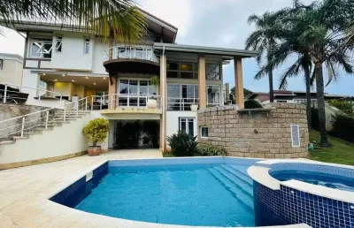 Casa mobiliada de alto padrão para venda no condomínio flamboyant em atibaia - sp.