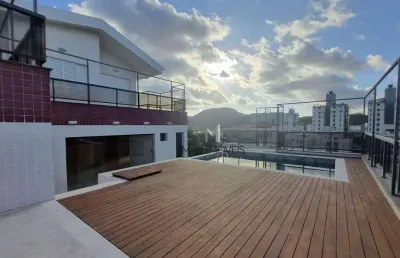 Linda cobertura duplex a 150 metros da praia do tombo no guarujá!