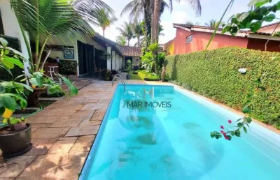 Casa térrea em condomínio fechado de alto padrão na região da praia de pernambuco no guarujá!