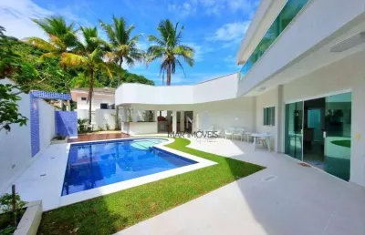 Linda casa com 5 suítes em condomínio fechado de alto padrão na praia de pernambuco no guarujá!