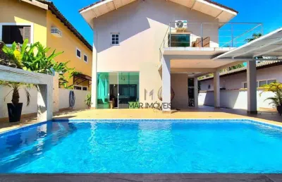 Casa em condomínio fechado, excelente localização na região da praia de pernambuco no guarujá!