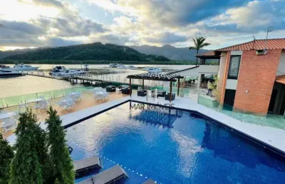 Casa com 2 suítes, lazer de clube, vaga náutica em excelente localização!