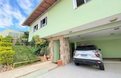 Casa com 4 quartos à venda na rua josé dutra, 89, coqueiros, florianópolis por r$ 1.590.000