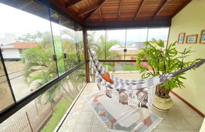 Casa com 4 quartos à venda na rua raimundo bridon, 0242, itaguaçu, florianópolis por r$ 2.200.000
