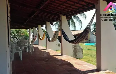 Vendo casa com terreno de 3.300m² na praia do presídio