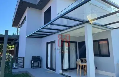 Casa com 4 dormitórios à venda, 194 m² por r$ 4.500.000,00 - jurerê internacional - florianópolis/sc