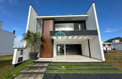 Casa em condomínio à venda em deltaville biguaçu, 3 suítes