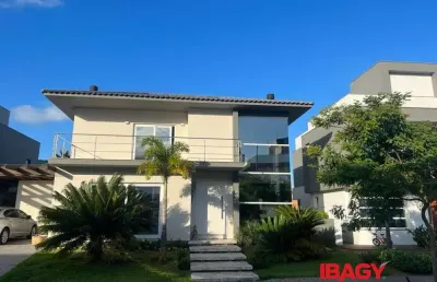 Excelente casa em condominio 4 dormitório(s) em rio tavares - florianópolis