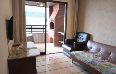 Apartamento na praia grande apenas 50 metros do mar.