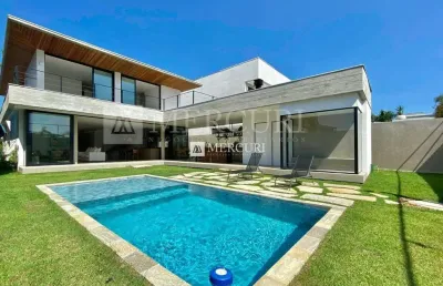 Casa de luxo com 5 suítes e design exclusivo no jardim acapulco