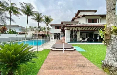 Luxuosa residência com 4 suítes e ampla área de lazer no condomínio jardim acapulco