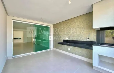 Apartamento no guarujá, enseada, 3 quartos sendo 1 suítes, sala para 2 ambientes e varanda goumert - mercuri imóveis - imobiliária no guarujá