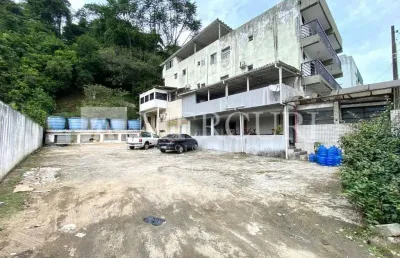 Terreno no guarujá, enseada, área de estacionamento e hotel