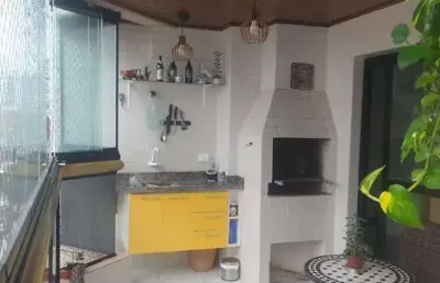 Apartamento com 3 dormitórios com varanda gourmet na na vila tupi na praia grande