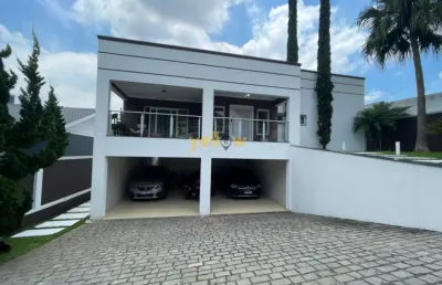 Casa de luxo em condomínio fechado em arujá com 4 suítes e 5 banheiros por r$ 4.5 milhões