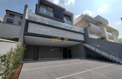 Casa luxuosa em arujá: 4 suítes no residencial real park
