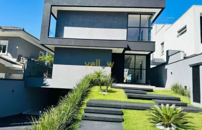 Casa luxuosa em arujá: 4 suítes no residencial real park