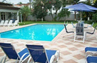 Casa com 4 dormitórios à venda, 1000 m² por r$ 4.500.000,00 - acapulco - guarujá/sp