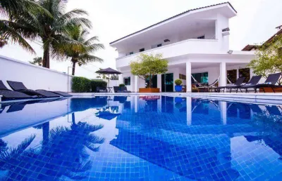 Casa com 4 dormitórios à venda, 395 m² por r$ 3.900.000,00 - acapulco - guarujá/sp