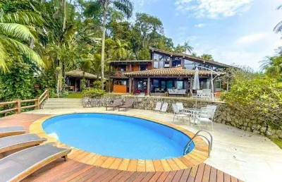 Casa com 6 dormitórios sendo 5 suítes à venda, 400 m² por r$ 15.000.000 - tijucopava - guarujá/sp