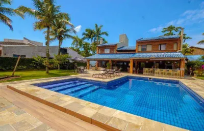 Casa em condomínio fechado com 6 quartos para alugar na Rua Julieta de Azevedo Bonavides, 280, Jardim Acapulco, Guarujá