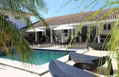 Casa com 4 dormitórios à venda, 480 m² por r$ 3.200.000,00 - acapulco - guarujá/sp