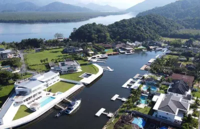 Casa em condomínio fechado com 5 quartos à venda na Estrada Bertioga, 1005, Marina Guarujá, Guarujá