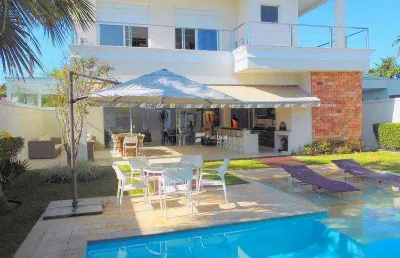 Casa com 5 dormitórios, 423 m² - venda por r$ 4.800.000,00 ou aluguel por r$ 31.357,00/ano - acapulco - guarujá/sp