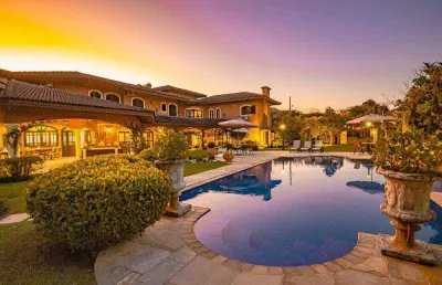 Casa com 6 dormitórios, 925 m² - venda por r$ 6.800.000,00 ou aluguel por r$ 10.000,00/dia - acapulco - guarujá/sp