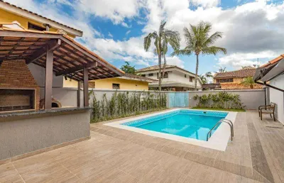 Casa em condomínio fechado com 4 quartos à venda na Avenida Romão Fidalgo Salgado Neto, 167, Jardim Acapulco, Guarujá